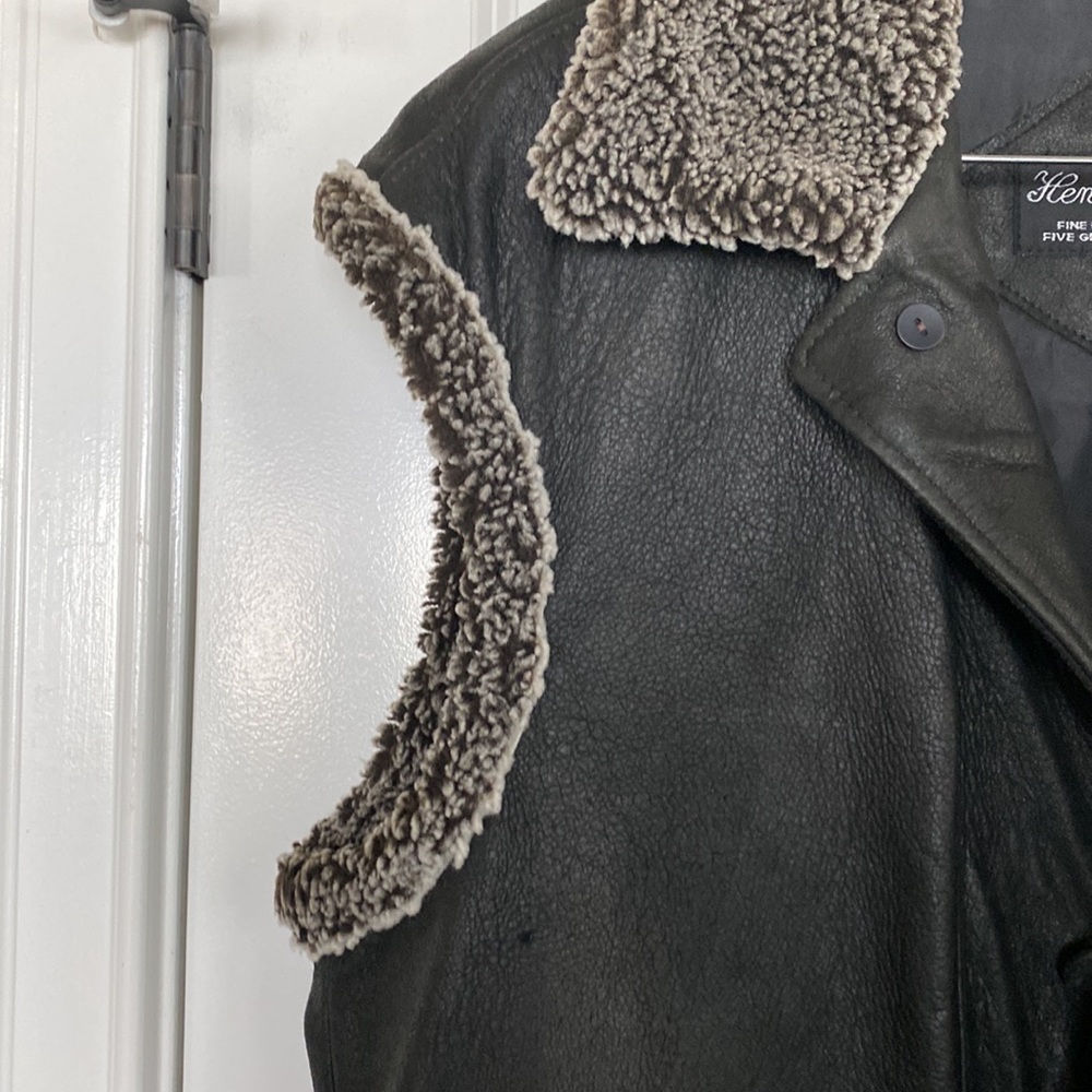 Henig Furs leather vest with shearling collar and trim.  NWOT.
